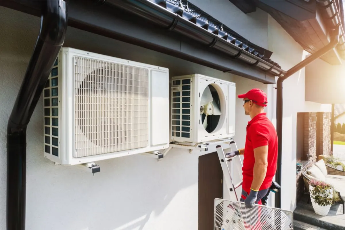 HVAC Technician Performing Air Condition and Heat Pump Units