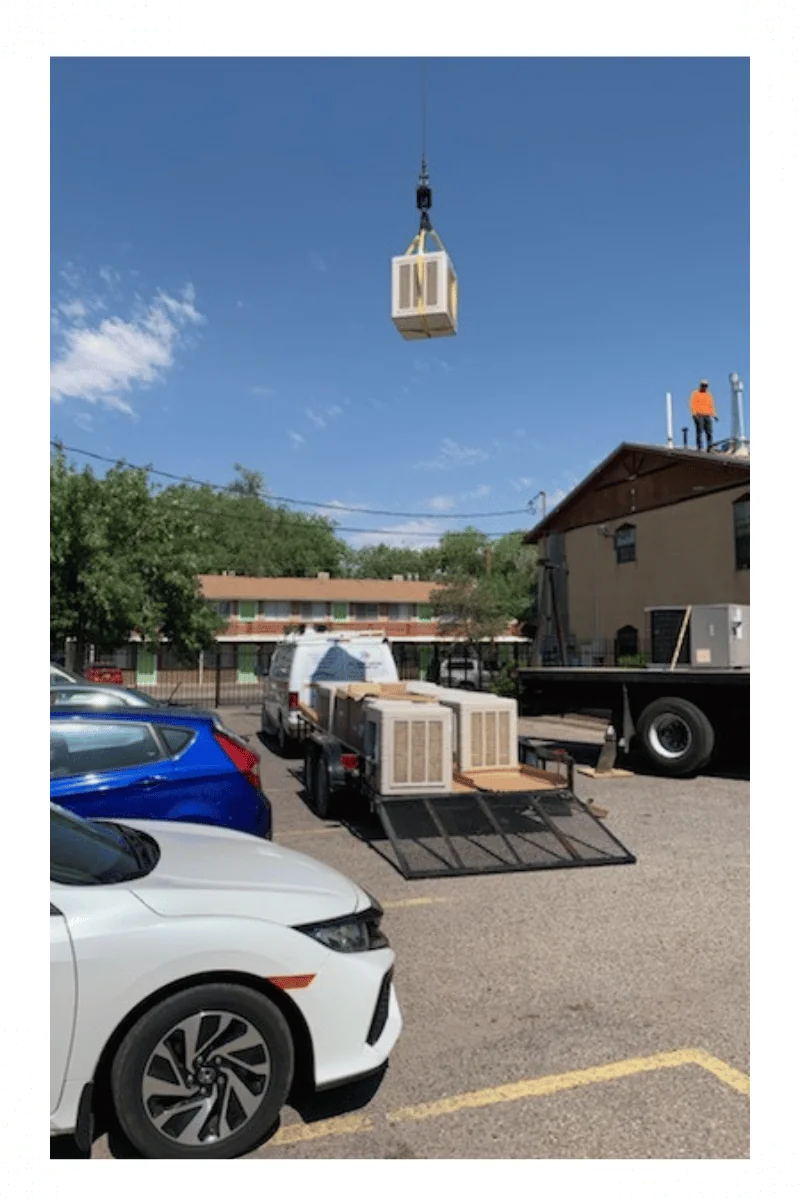 Contractors installing Air Condition Units in Commercial Rooftop